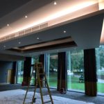 Dropped ceiling containing air conditioning unit